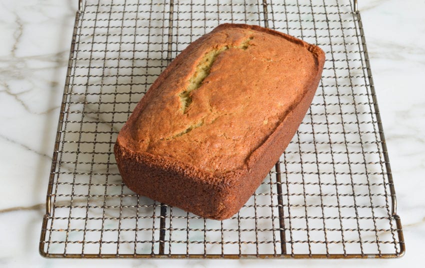 banana bread cooling on rack.