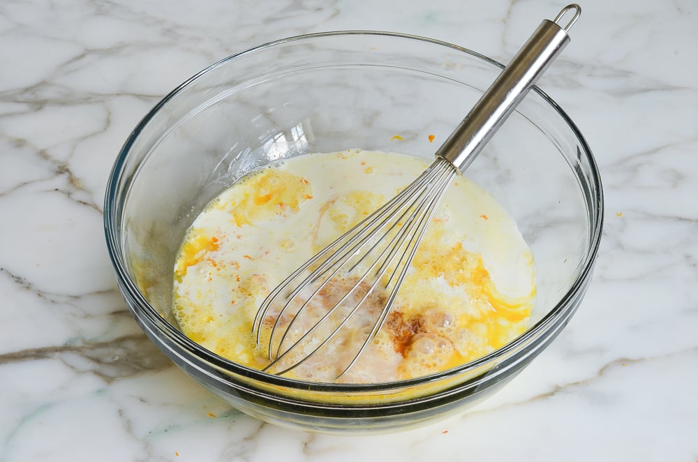 Custard ingredients in a mixing bowl.