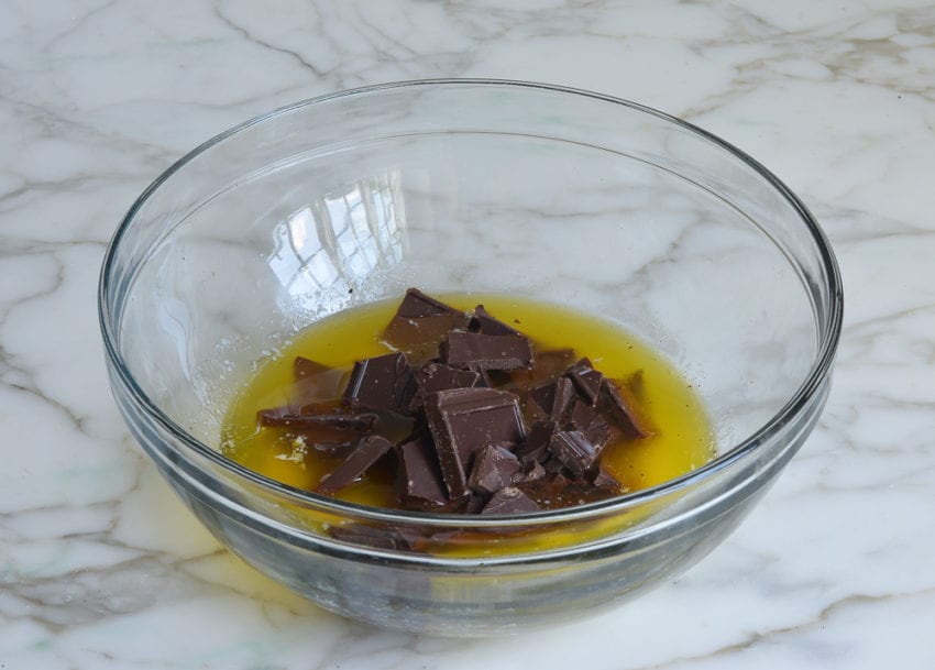 melted butter and chopped chocolate in mixing bowl