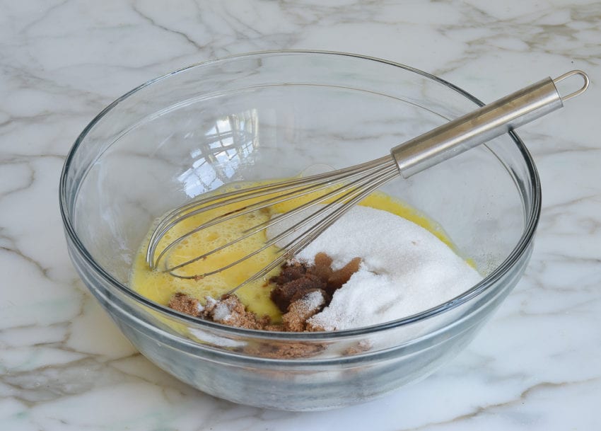 eggs, sugars, and flavorings in mixing bowl