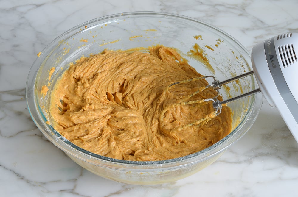 Bowl of pumpkin bread dough.
