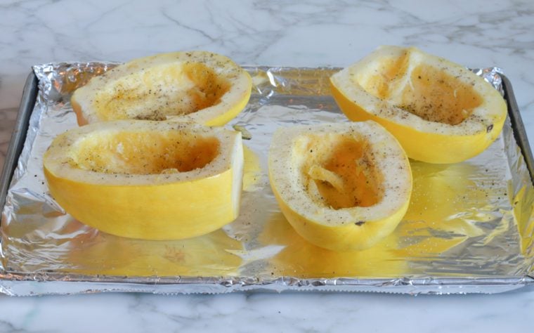 seasoning squash with oil, salt, and pepper