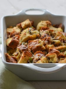 Baking dish of challah, wild mushroom, and herb stuffing.