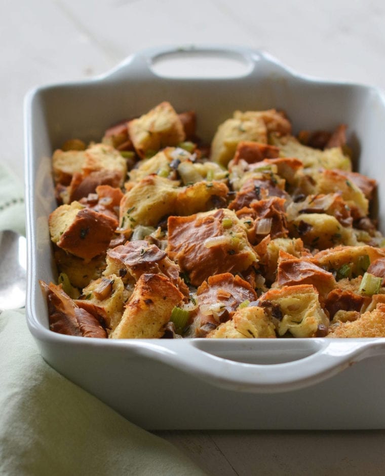 Baking dish of challah, wild mushroom, and herb stuffing.