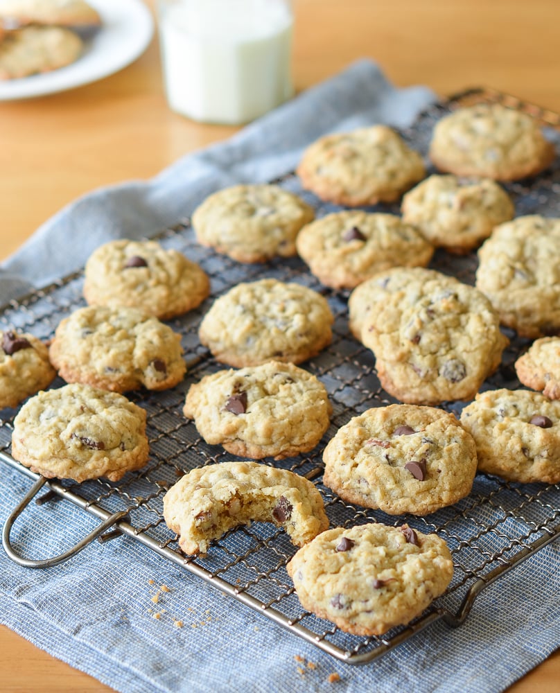 Chocolate chip cookies on a wire rack.