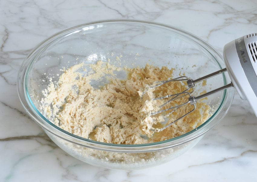 Bowl of creamed butter and sugars.