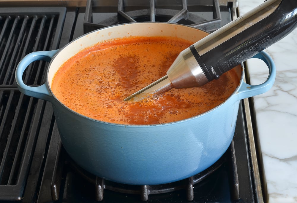 blending the soup with an immersion blender.