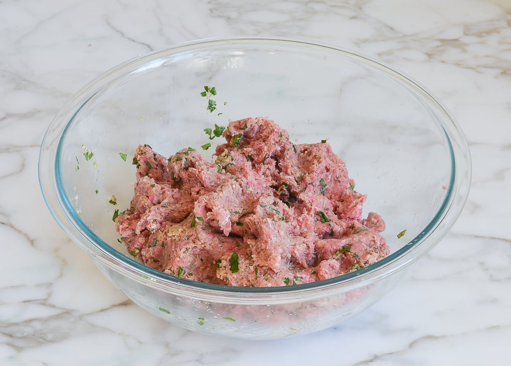 Meatball mixture in a bowl.
