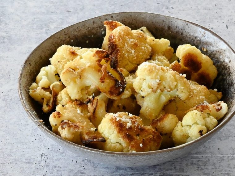 Bowl of roasted cauliflower.