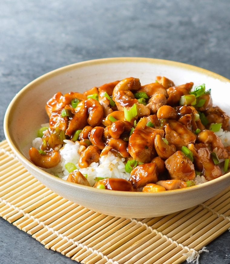 Bowl of cashew chicken over rice.