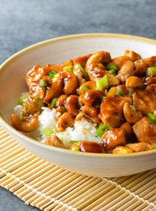 Bowl of cashew chicken over rice.