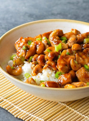 Bowl of cashew chicken over rice.