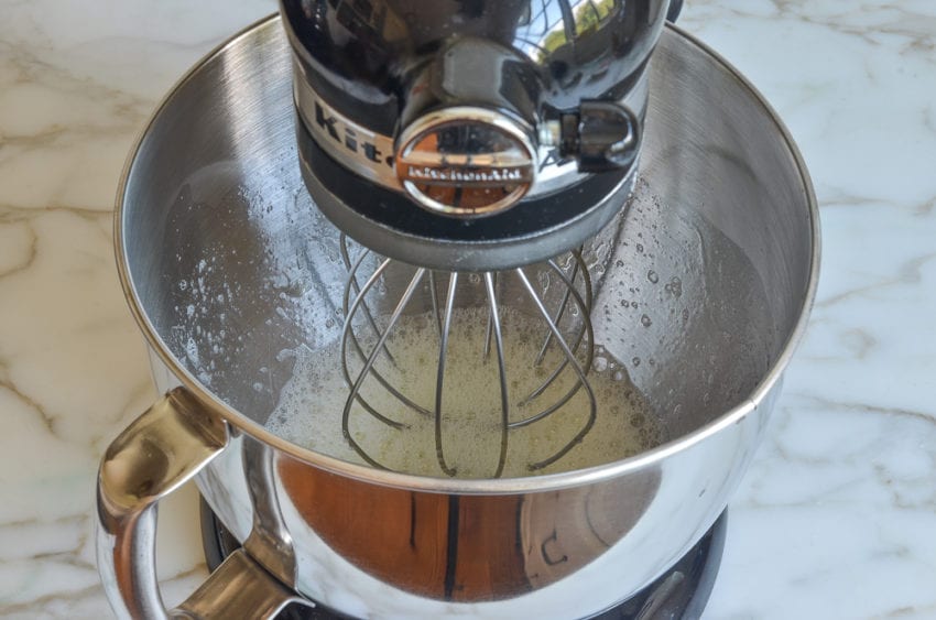 beating the egg whites until foamy