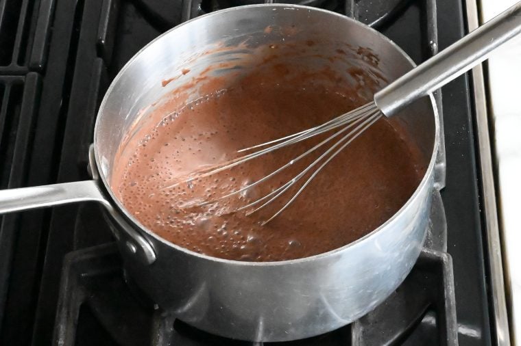 whisking in the milk