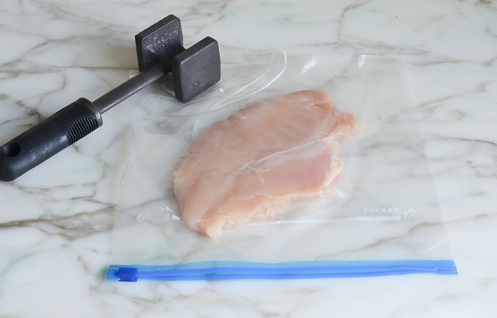 pounding the chicken breasts