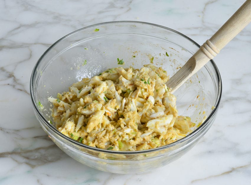 Crab mixture in a glass bowl.