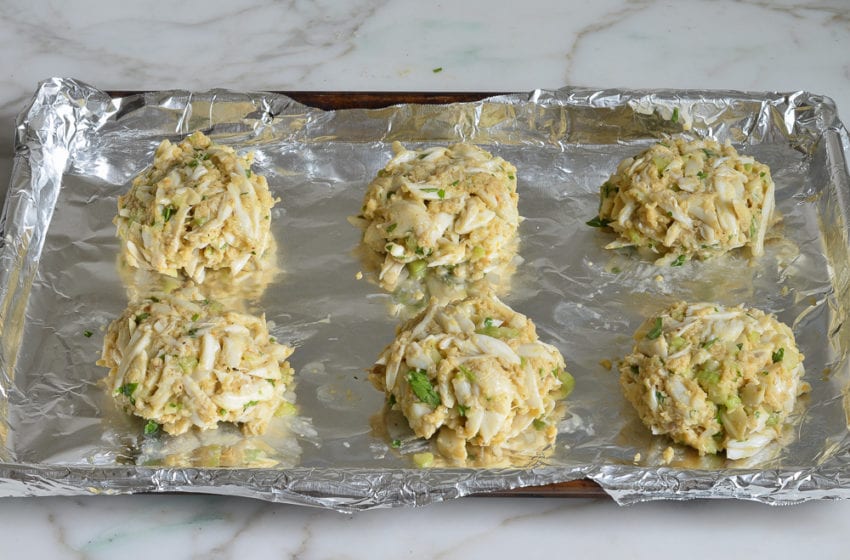crab cakes formed on baking sheet