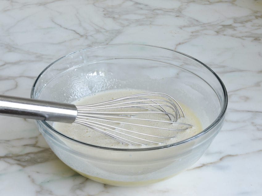 Whisk in a bowl of milk and egg mixture.
