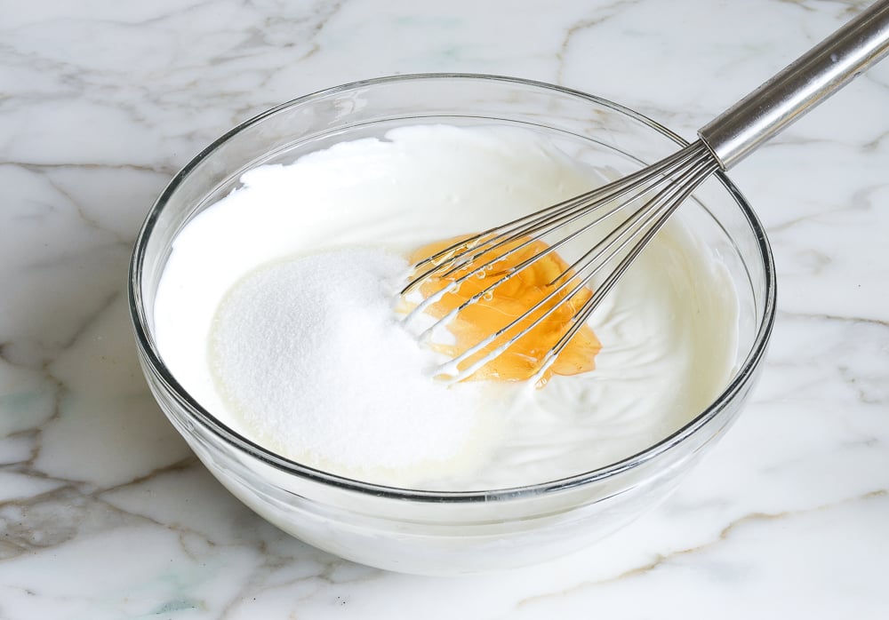 yogurt, sugar and honey in mixing bowl