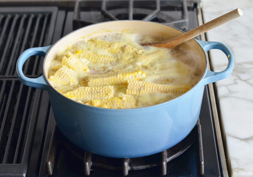 Boiling Dutch oven of corn soup.