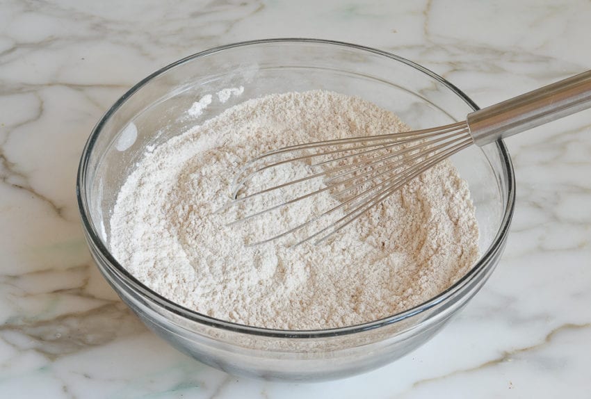 Whisk in a mixing bowl of dry ingredients.