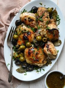 Chicken marbella on a platter.