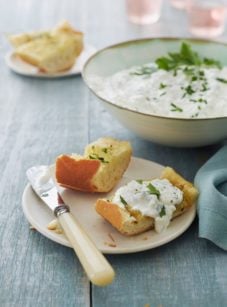 Bread topped with a cottage cheese spread.
