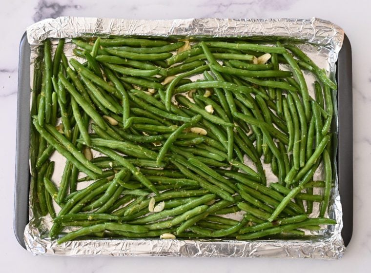 green bean mixture on baking sheet