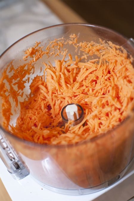 SweetPotatoPancakes 2 Shredded sweet potatoes in a food processor.