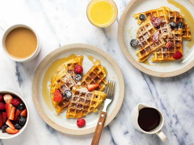 Plates of yeasted waffles.