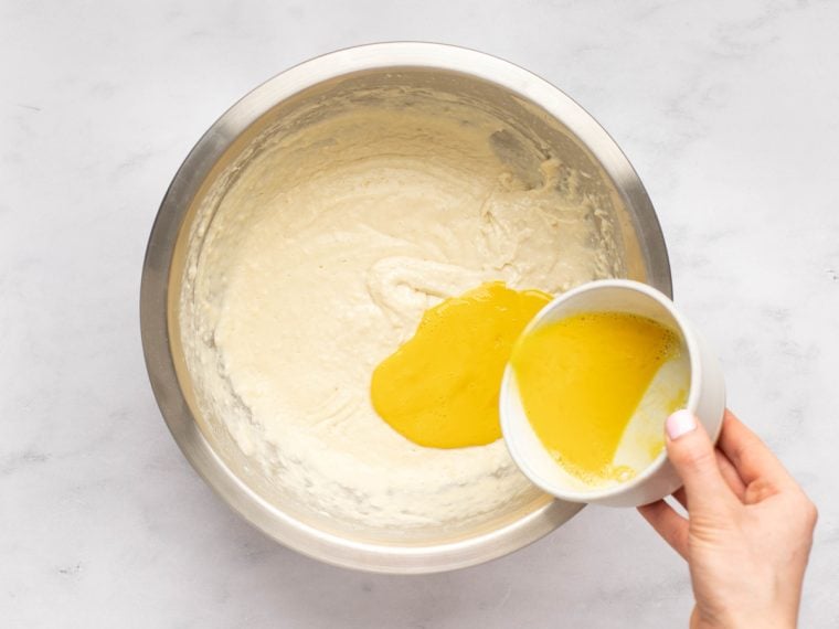 adding the egg mixture to the batter