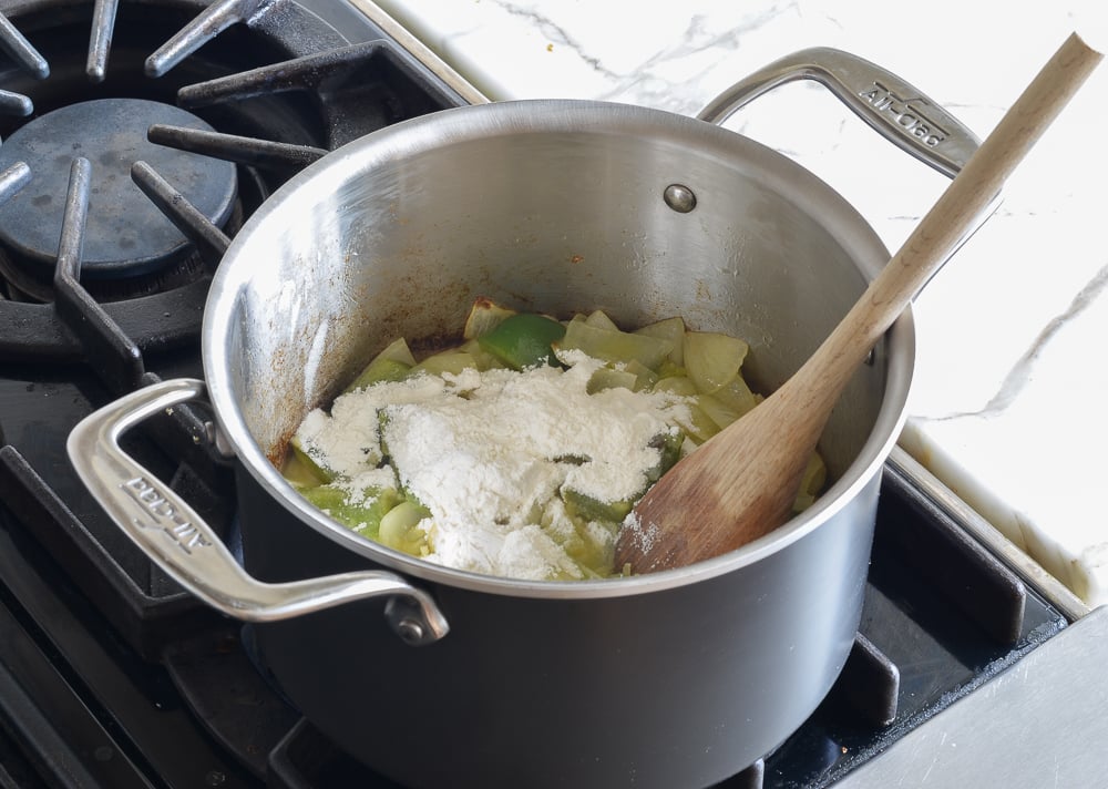 Flour in a pot with vegetables.