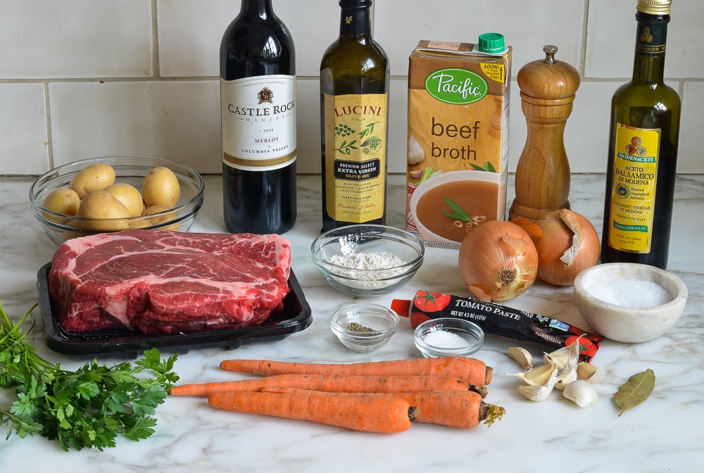 Stew ingredients including carrots, tomato paste, and beef broth.