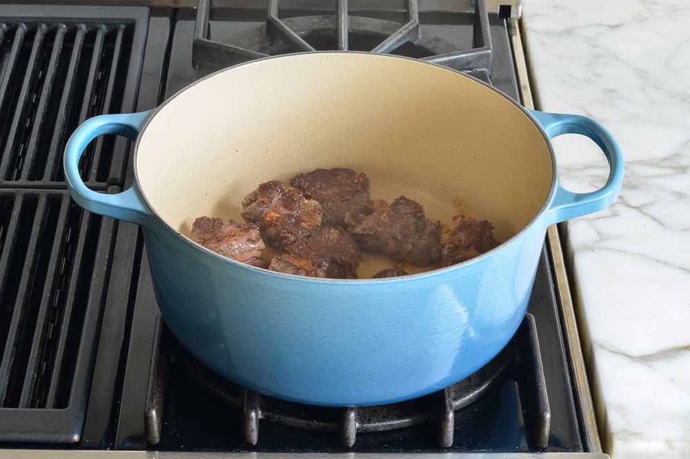 This step is a bit time-consuming but browning the meat adds depth and dimension to the stew.