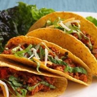 Plate of chicken tacos.