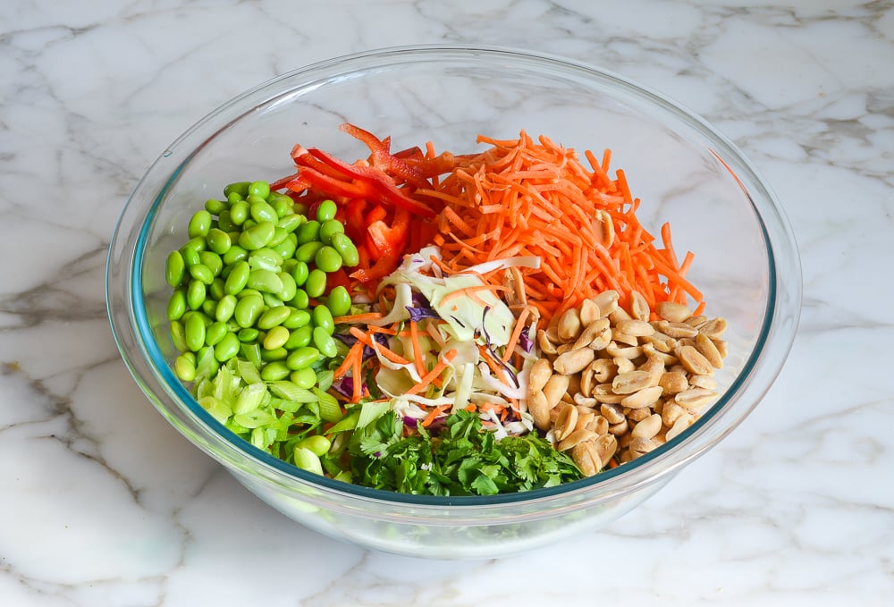 slaw ingredients in mixing bowl