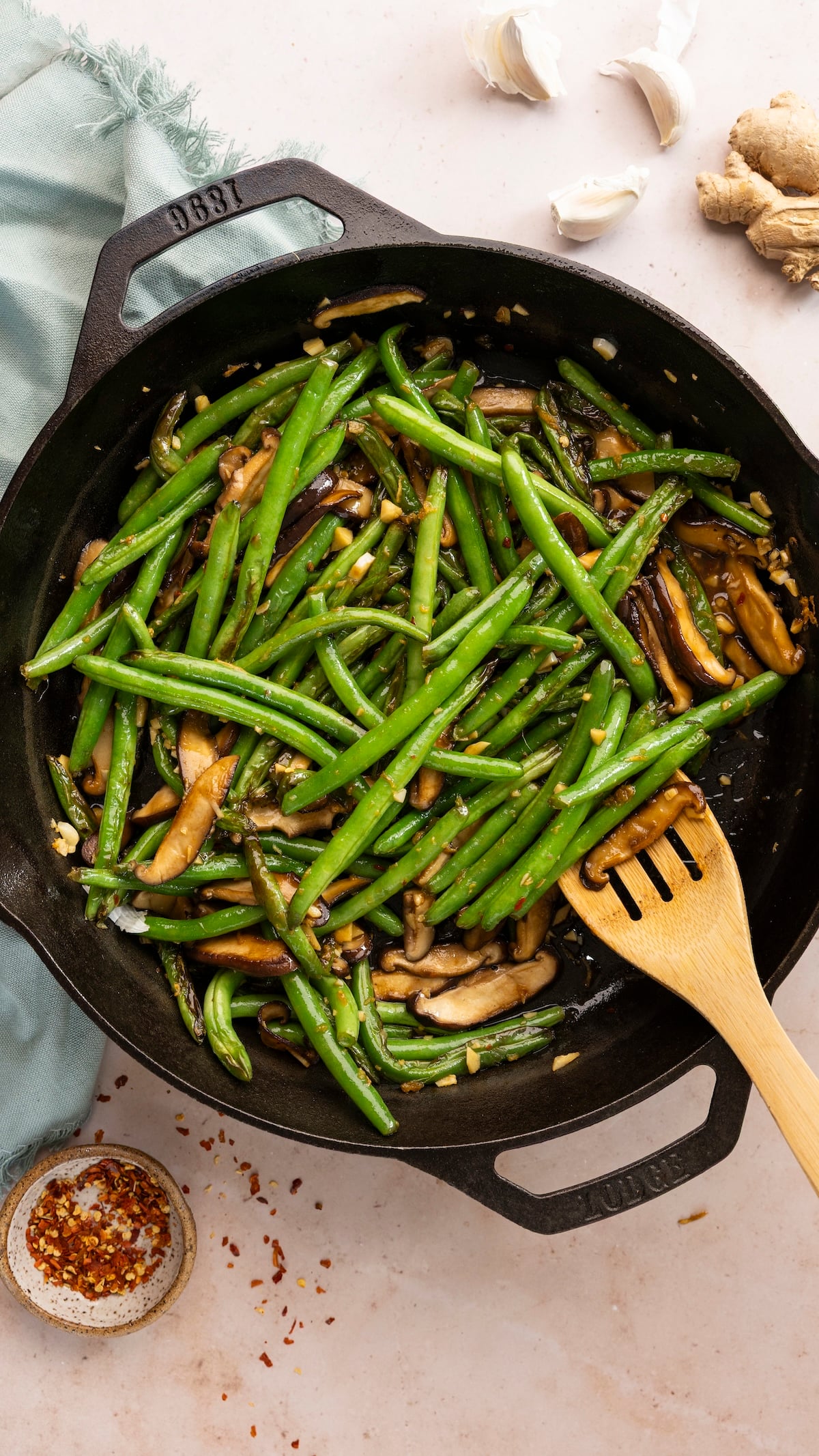 Cooked Szechuan green beans in skillet