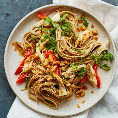 Plate of soba chicken noodle salad with ginger peanut dressing.