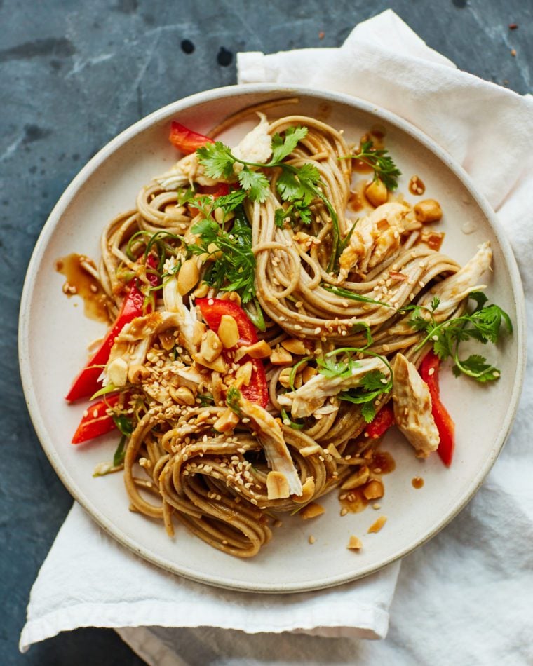 Asian chicken noodle salad on a plate.
