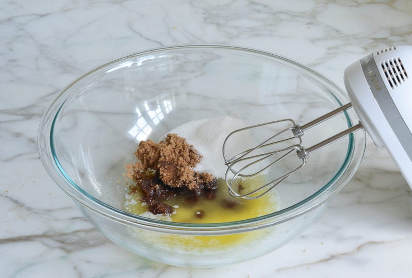melted butter and sugars in mixing bowl