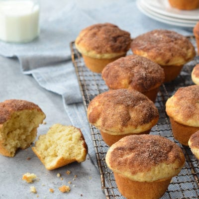 Doughnut muffins on a wire rack.