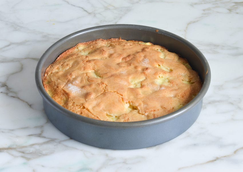 French apple cake in a cake pan.