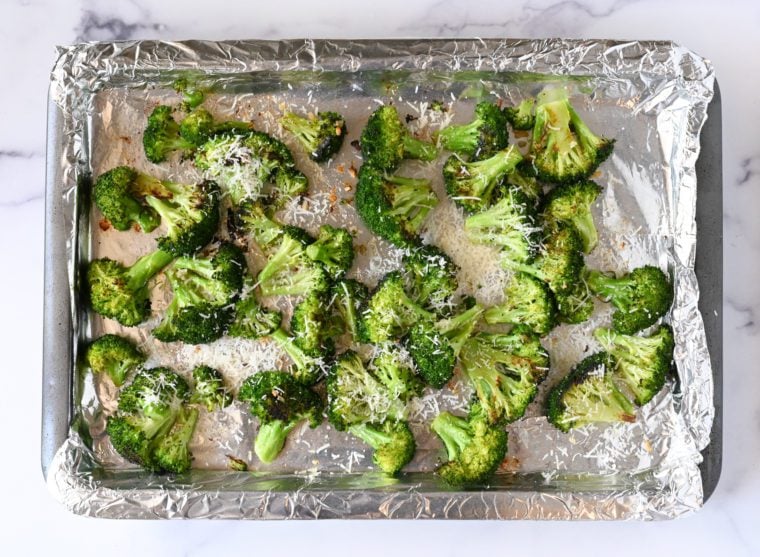 cheese sprinkled over broccoli