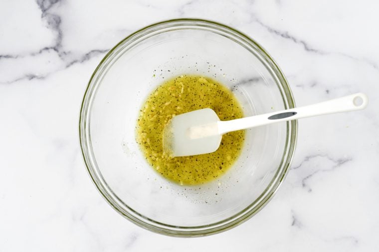 oil, garlic, and seasoning in mixing bowl