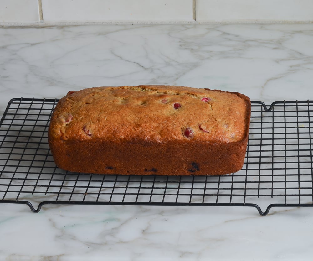 Cranberry Nut Bread on a wire rack.