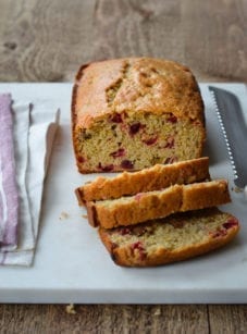 Cranberry Orange Bread on cutting board.