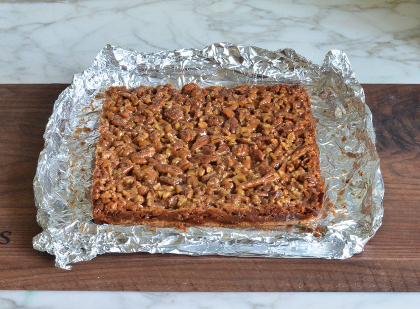 large pecan square on foil.