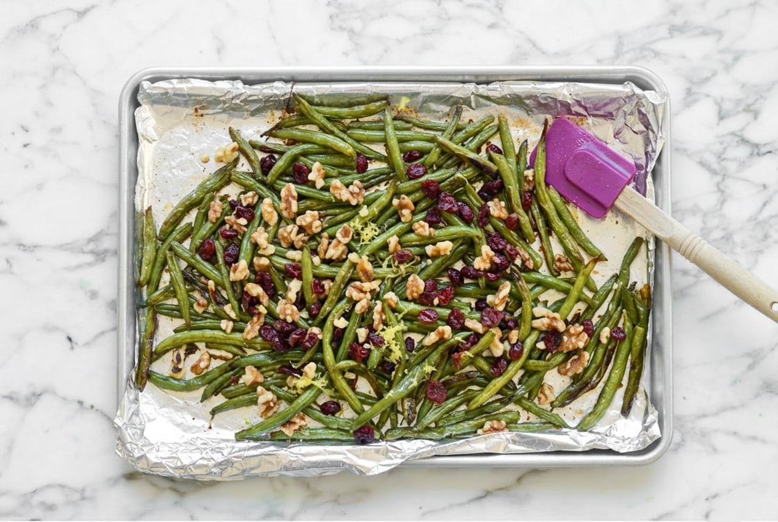 Roasted green beans tossed with add-ins. 