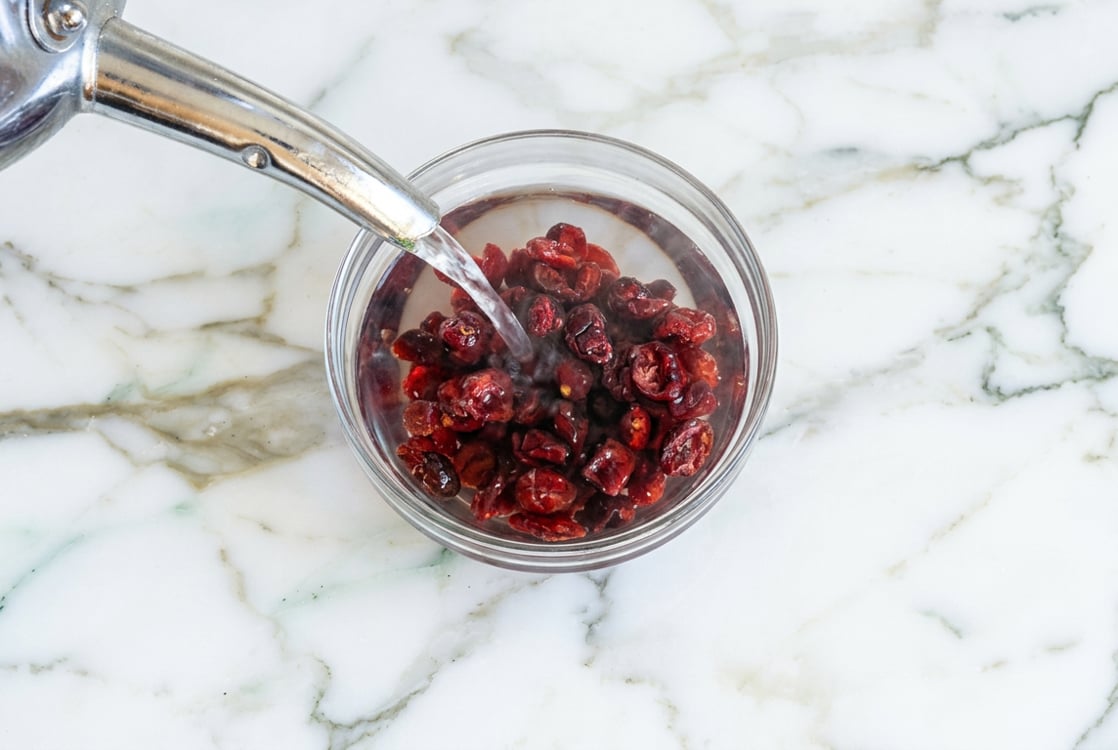 Rehydrating dried cranberries.