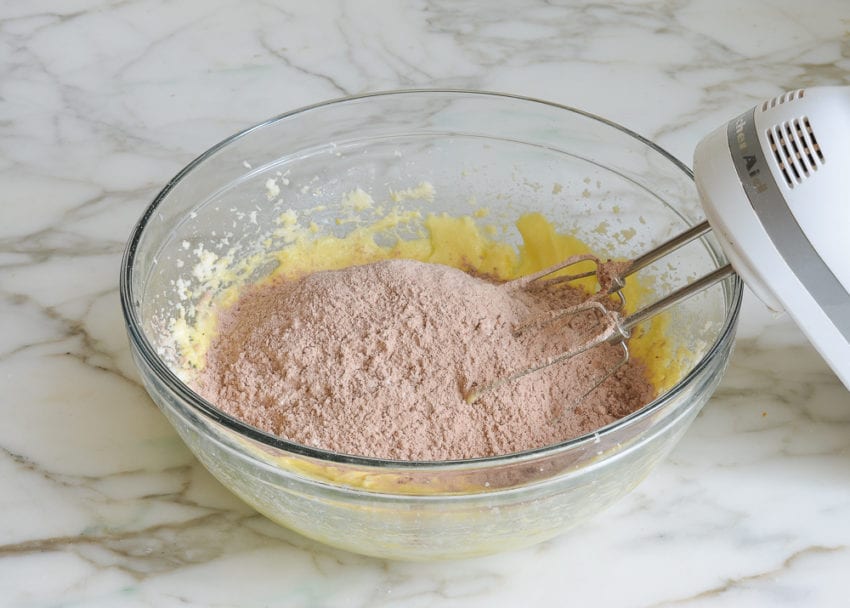 adding dry ingredients to wet ingredients